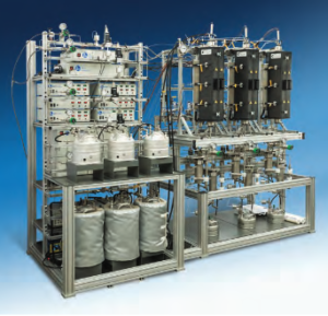 This system has three 250 mL reactors operating in parallel and controlled by a 4871 Process Controller with operator interface on a single PC. This system has weighed feed tanks and a two-stage pressure let down.